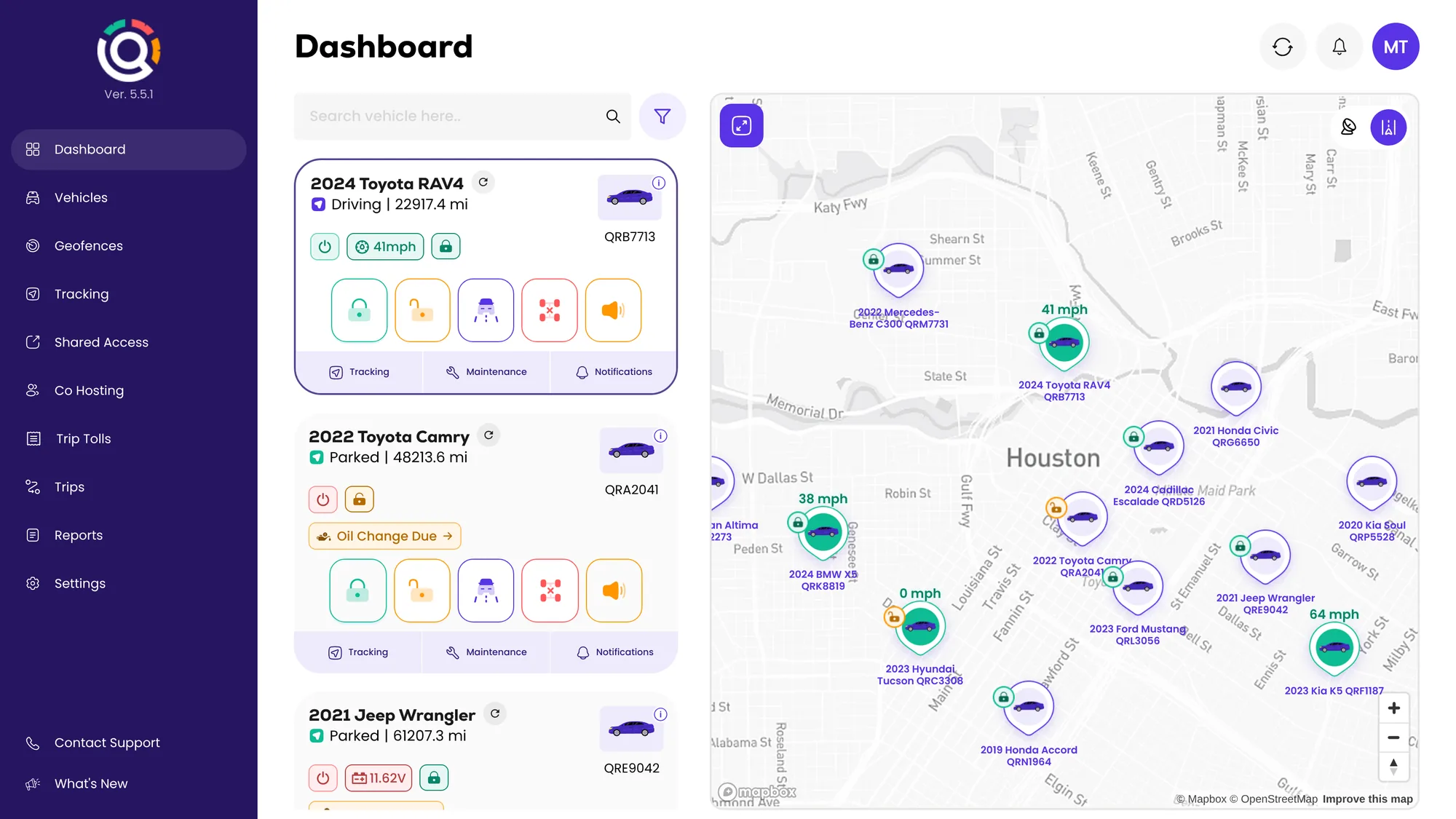 The Qarhami Dashboard on a laptop: every car's card beside a live map of the fleet