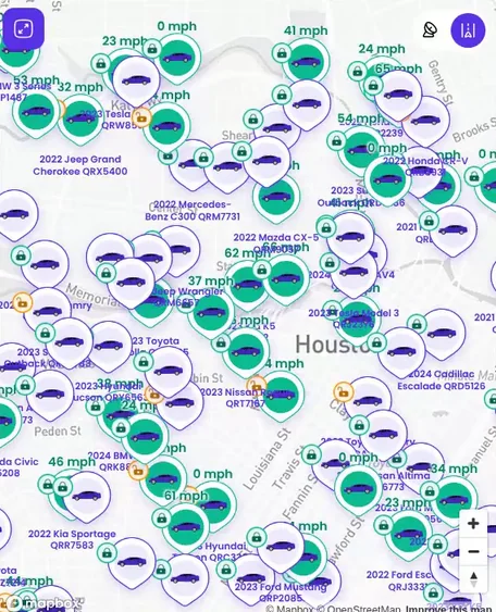 The fleet map in the Qarhami dashboard, crowded with vehicles across Houston