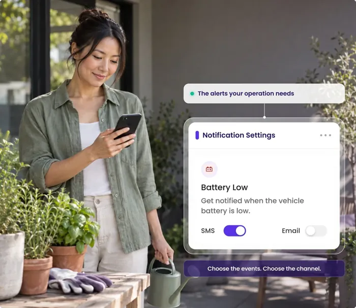 A woman in a garden; the Notification Settings card shows the Battery Low alert turned on.
